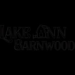 Lake Ann Barnwood specializes in reclaimed wood furniture and decor, preserving history while creating custom designs.