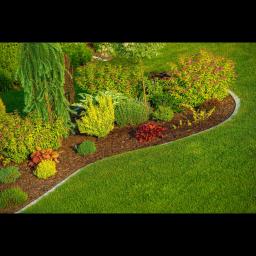 Transforming outdoor spaces in Salt Lake City with expert landscaping solutions including pavers, retaining walls, and xeriscapes.